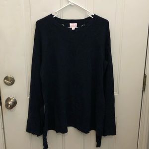 Gorgeous navy sweater with tie sleeve details